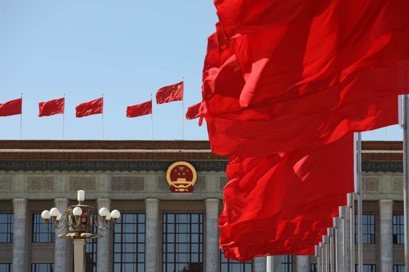 中共二十大通過《中國共產(chǎn)黨章程(修正案)》。修正后的新黨章全文26日公布。(摘自中新社).jpg
