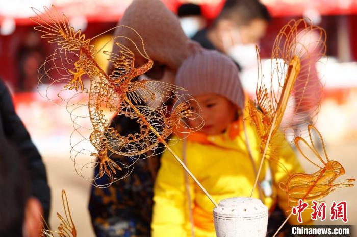 北京消費季“2023——年花豐食大集”正月初一在北京世界花卉大觀園開市?！?lt;a target='_blank' href='/'>中新社</a>記者 富田 攝