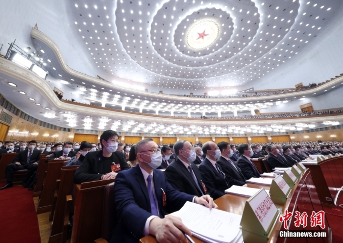 3月7日，十四屆全國人大一次會(huì)議在北京人民大會(huì)堂舉行第二次全體會(huì)議。<a target='_blank' href='/'>中新社</a>記者 盛佳鵬 攝