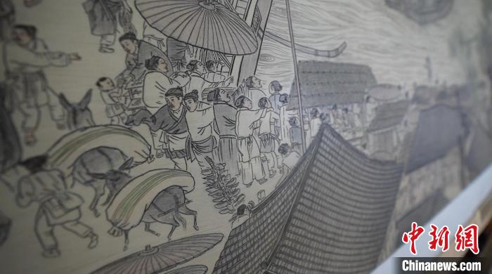 藺烈板刻線畫作品《清明上河圖》局部?！∪诸?攝